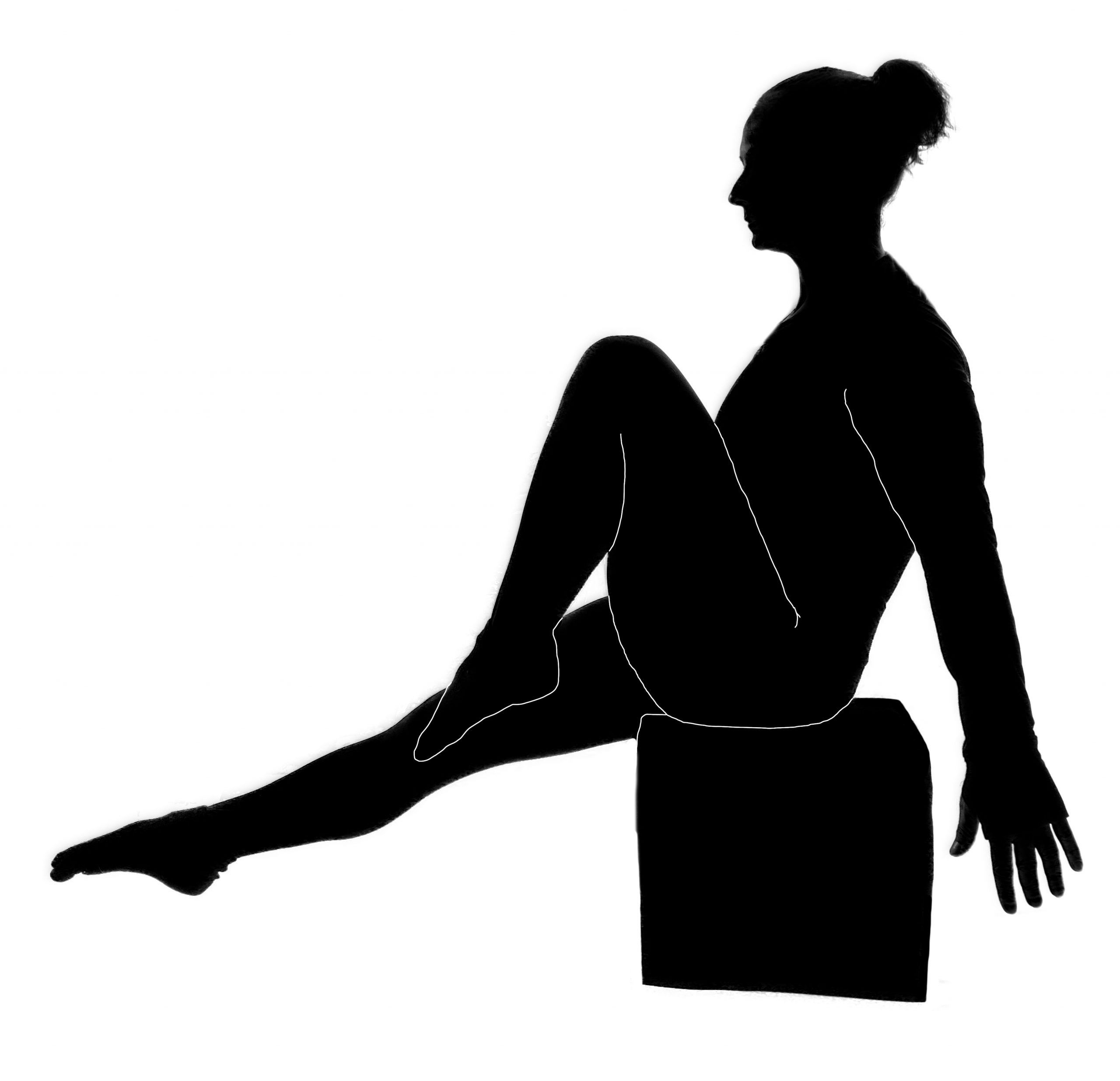 woman pulling knee to chest while sitting - exercise